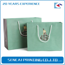 Green logo printed custom kraft paper bag, matte laminated paper bag manufacturer, shopping bag custom paper bag